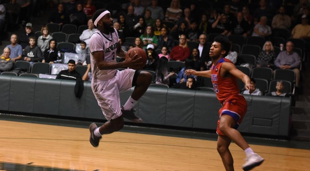 Fast start paces Seward hoops to easy win over Cougars and date in Region VI finals