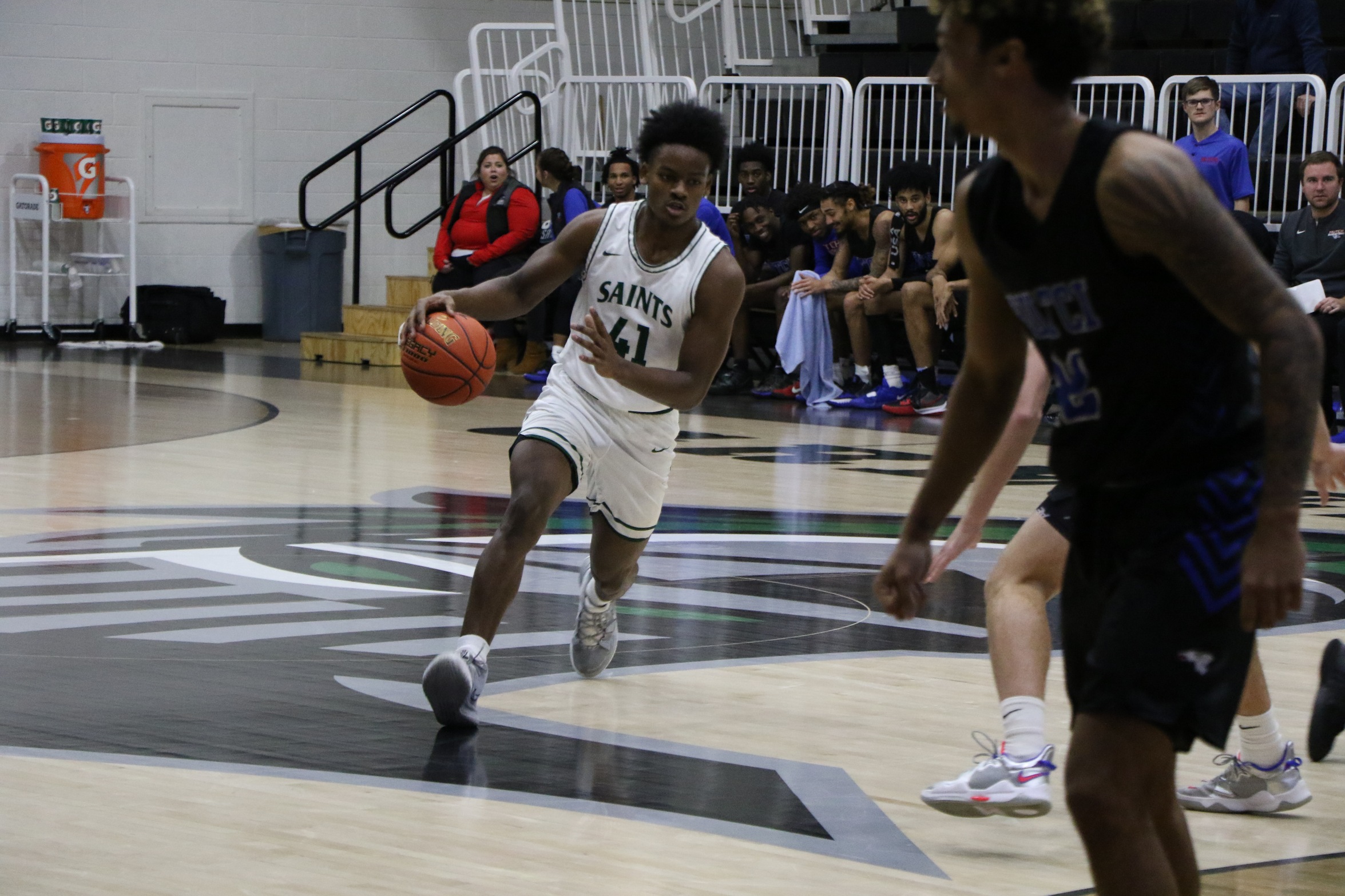 Saints fall to No. 7 Blue Dragons 81-66