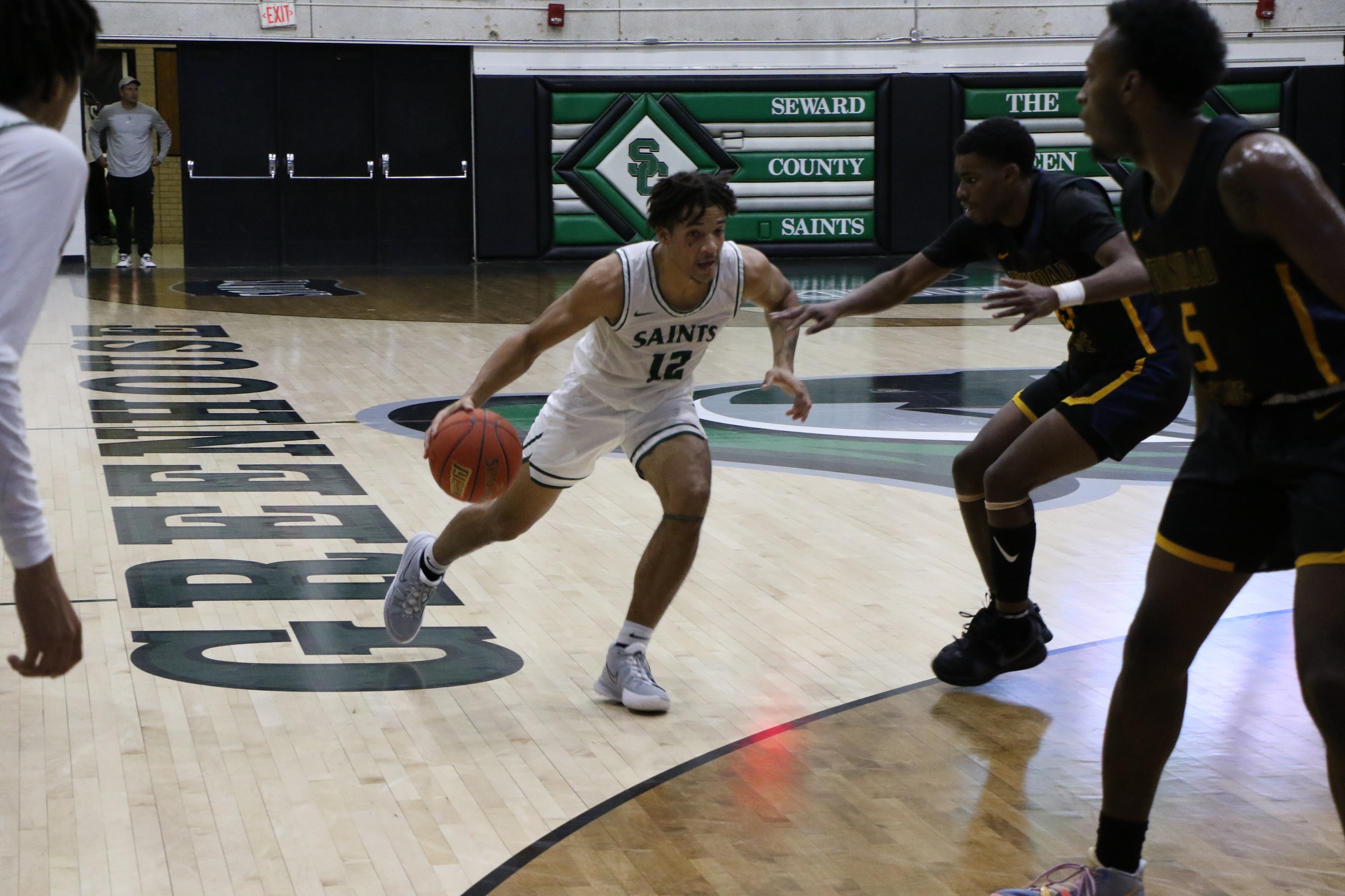 The Saints win 85-72 over Trinidad in their home opener