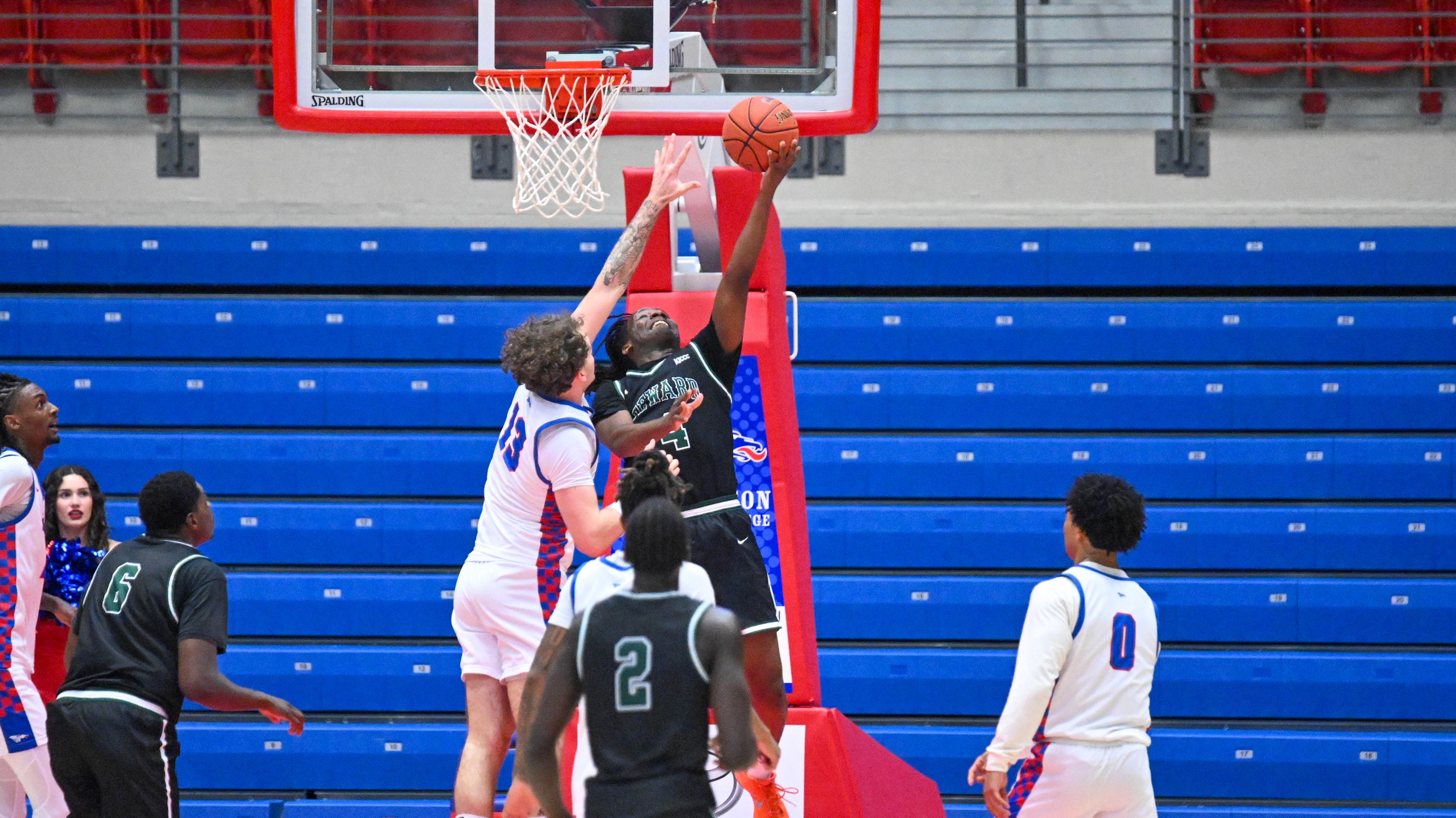 Freshman guard RJ McKinnie puts up a layup for the Saints. He finished with a team-high 14 points to go with five rebounds and three assists in Seward's 53-48 win at Hutchinson Saturday. Photo Courtesy of Andrew Carpenter/Digital Fox Photography&nbsp;