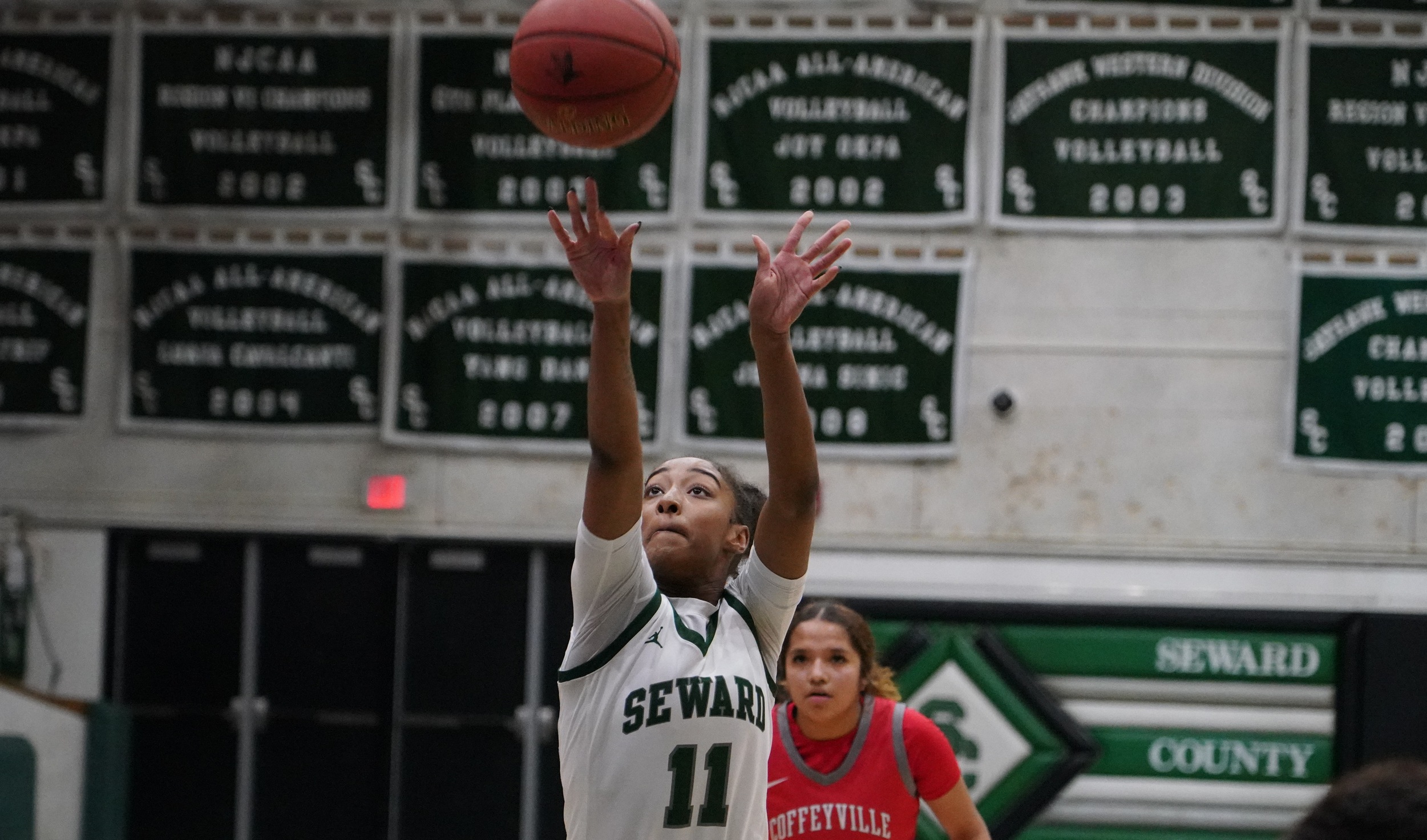 Lady Saints survive on last-second shot, post 52-50 win at Broncbusters