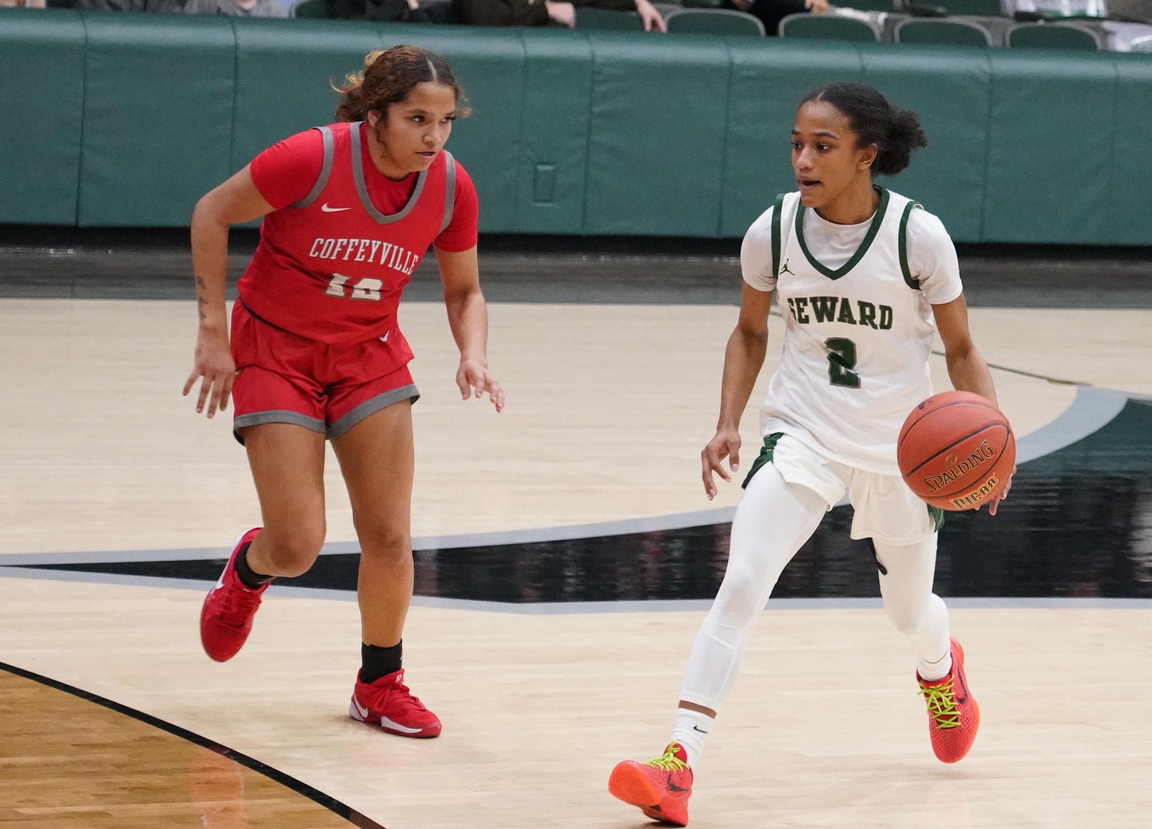 Lady Saints struggle from outside, fall at unbeaten Hutchinson, 52-40