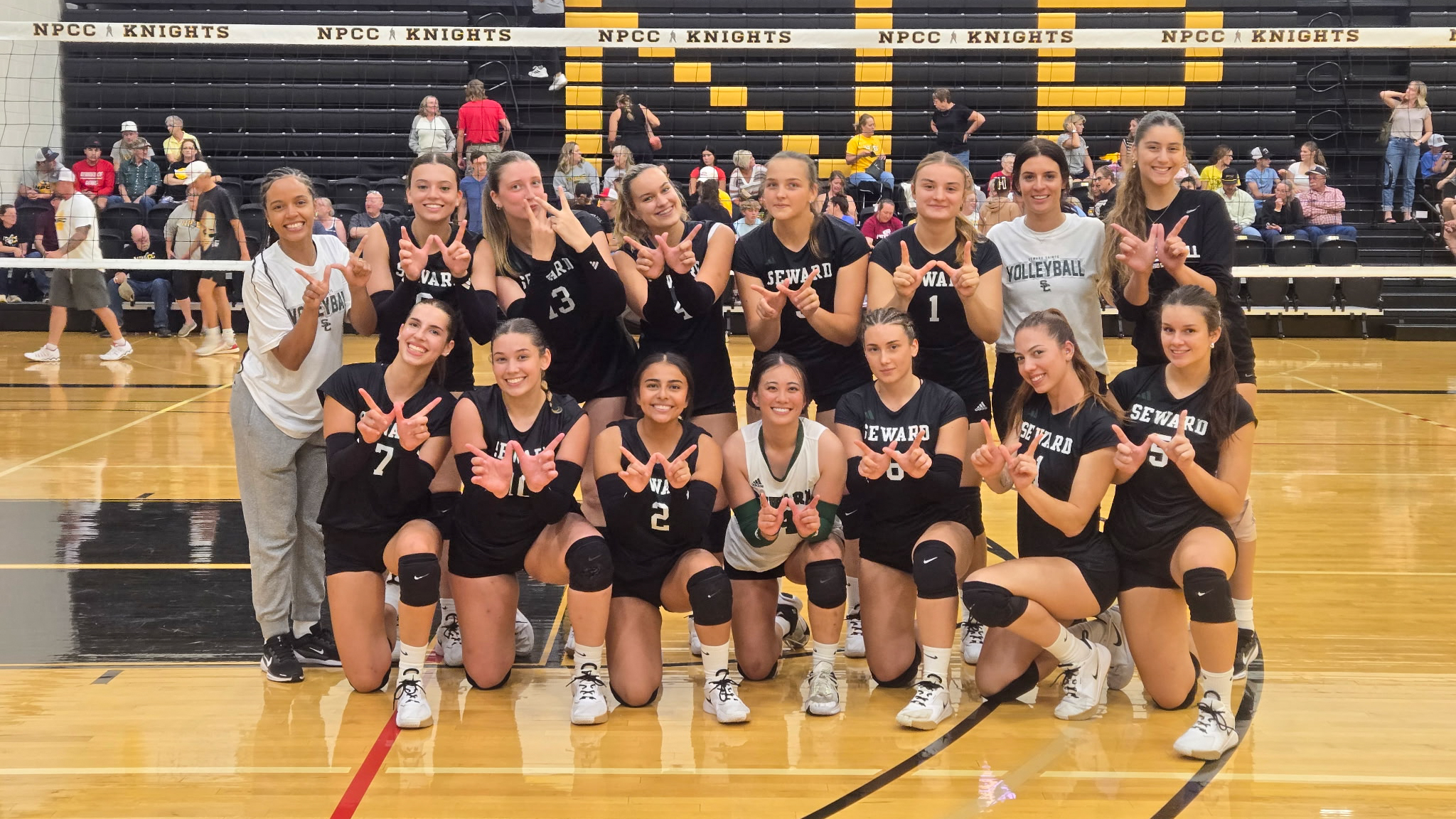 The Saints pose for a team photo at the conclusion of the North Platte Tournament in McDonald-Belton Gym